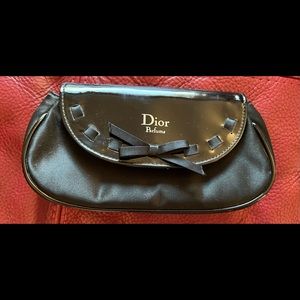 Dior perfume clutch.